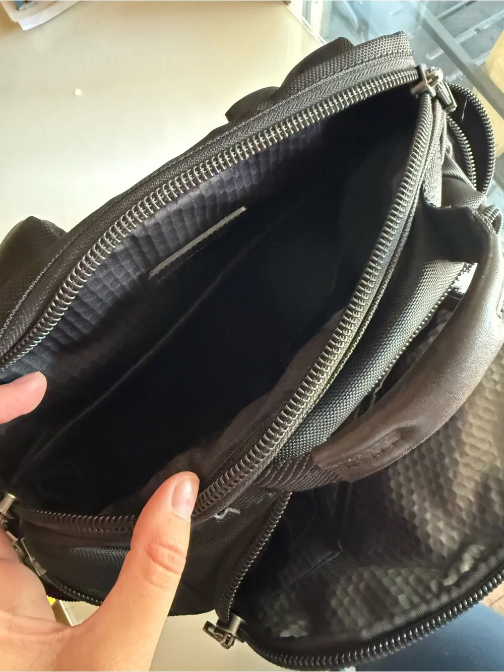 Tumi spacious backpack